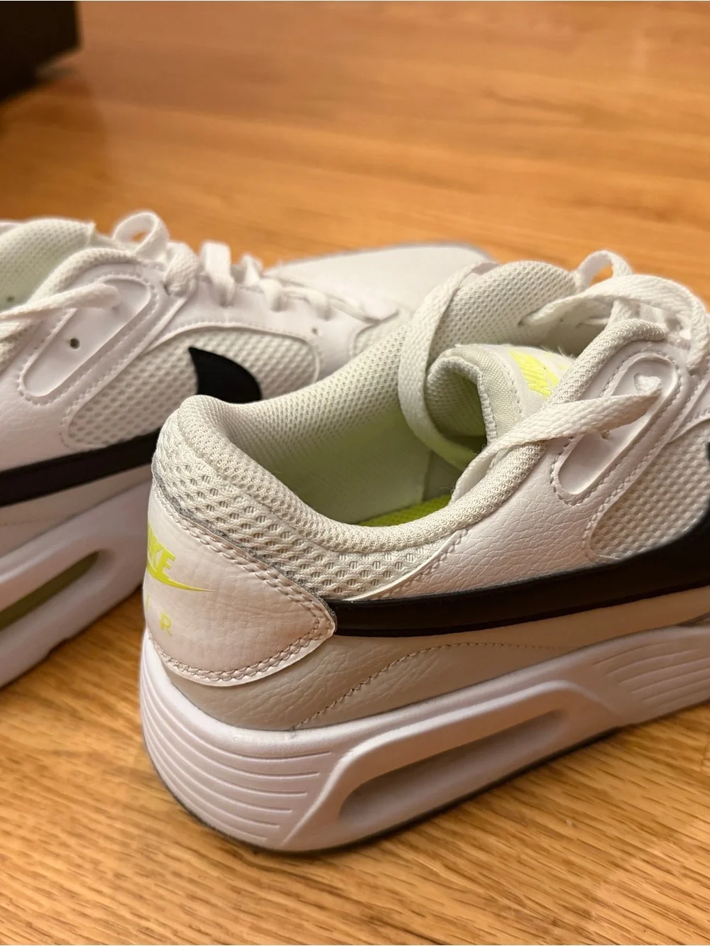 Nike Men's White Sneakers with Black Swoosh and Neon Yellow Accents